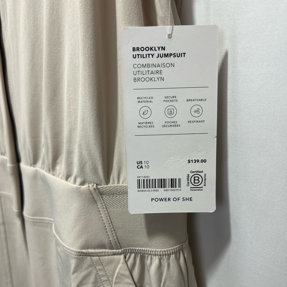 Athleta Cream Jumpsuit with Tie Waist and Relaxed Fit